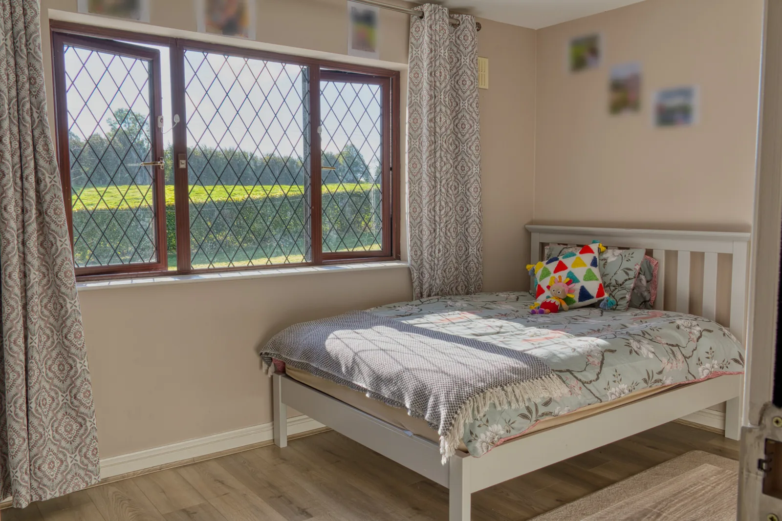 A bedroom looking out over the garden